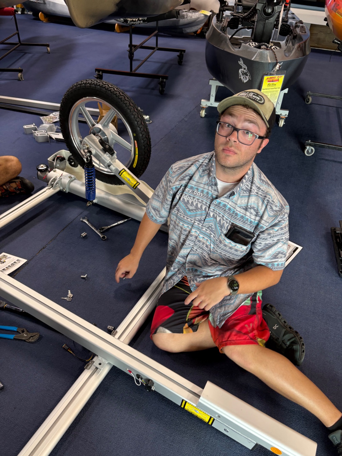 Jacob hard at work assembling a New Rack n roll Trailer